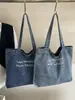 Bolsa de Mezclilla Casual de Gran Capacidad Shuai Mijia para Mujer 2026 Nuevo Bolso de Hombro para el Trabajo Ligero Bolso Tote para Estudiante Universitario