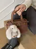 Bolso de Mano Pequeño de Alta Gama Estilo Coreano para Mujer 2026 Nuevo Modelo Bolso de Hombro Retro Sencillo para el Trabajo y los Viajes Diarios Bolso Cruzado de Moda