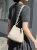 2026 Nuevo Diseño de Nicho Bolso Tejido Moda Versátil Bolso de Hombro Cruzado Bolso Cubo Bolso Casual
