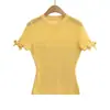 CL2650-26 Camiseta de Punto de Verano Estilo Coreano Ajustada Lisa Cuello Redondo Hueca con Lazo Manga Corta para Mujer