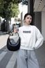 Nuevo Bolso de Axila de Alta Gama Combinable Lujo Ligero Nicho Europeo y Americano Negro Bolso de Hombro Media Luna Tejido a Mano Bolso de Media Luna