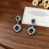Pendientes de Moda Europeos y Americanos de Nuevo Estilo Inspirados en Chanel con Perlas para Mujer, Clavos de Estrella Versátiles, Accesorios para Orejas con Borlas Exageradas