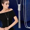 Collar largo de cadena para suéter con accesorios florales transfronterizos para mujer, colgante de borla de cristal, colgante para ropa, joyería simple al por mayor