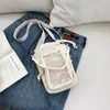 Bolso para teléfono de nuevo estilo 2026, con compartimento para botella de agua y colores contrastantes, un bolso cruzado ligero y lindo para mujer