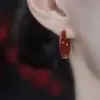 Brincos circulares vermelhos, festivos, com efeito de gota de óleo, nova tendência 2026, design de nicho, brincos versáteis de Ano Novo