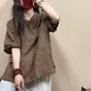 Nueva camisa de manga corta estilo chino con tapeta diagonal y cierre de botones, colección de verano 2026 para mujer, de alta gama, con una estética china tradicional y un diseño inspirado en el Zen, hecha de algodón y lino