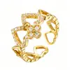 Anillo nuevo de estilo europeo y americano transfronterizo de lujo ligero, forma de corazón, corazón de amor, lazo, pavimentado con microcirconias, geométrico, abierto, anillo para el dedo, venta al por mayor