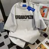 Camiseta Feminina de Manga Curta com Estampa de Letras da Marca Americana Ins Tendência Verão 2025 Casual Solta Moda Versátil Gola Redonda