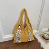 Bolsa casual grande capacidade para mulheres, para férias à beira-mar transfronteiriças, nova moda 2026 bolsa de ombro de tricô, bolsa de ombro para o dia a dia