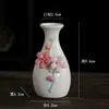 Jarrón pequeño hidropónico minimalista de cerámica tallado a mano, adorno decorativo floral mini fresco creativo para sala de estar, adecuado para flores secas