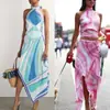 Traje satinado con estampado sexy para mujer, nuevo estilo de verano 2026, conjunto de dos piezas con top de amarre y falda