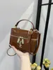 Bolso de Mano de Caja Brillante con Textura de Gama Alta para Mujer, 26 Modelos Nuevos, Moda Transfronteriza Trendy Nicho Diario Bolso de Hombro y Cruzado