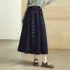 Nova saia evasê com cintura elástica, barra larga, botões múltiplos de fileira única para mulheres, outono de 2026, jeans, que cobre o quadril, fluida, versátil, saia midi