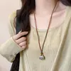 2026 Nuevo Colgante de Bolso Geométrico Cordón de Cuero Collar Largo para Mujer, Nuevo Estilo Chino, Gama Alta, Lujo Ligero, Accesorio de Diseño de Nicho