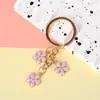 Novo Pingente Chaveiro de Metal Sakura Menina Simples Coração Flor Decoração de Celular Acessórios Pingente de Bolsa Venda por Atacado