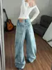 Chao Li tiene stock Lavado retro y desgastado Estilo de corte Doble botonadura Pantalones vaqueros Scimitar para mujer Otoño Nuevo de pierna ancha Largos