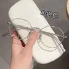 Nuevo marco de gafas metálico poligonal retro artístico pequeño, marco de gafas liso de moda Danyang al por mayor, se puede equiparar con lentes graduados