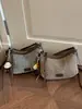 Bolsa tejida casual para mujer Shuai Mi Jia, nuevo estilo de otoño 2026, bolsa de paja, bolso de hombro y cruzado de moda nicho
