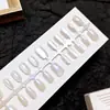 Puntas de Uñas Artísticas Simples Transparentes Estilo Ojo de Gato Anchas Tiras Pre-hechas 30 Piezas Por Tamaño Uñas Portátiles Fábrica Directa Personalización