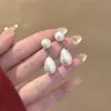 Pendientes de Plata Aguja Minimalistas y Únicos Estilo Francés Clásico Niche con Borla de Gota de Agua y Perlas, Dulces, Elegantes, Modernos y Frescos