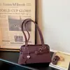Bolso de hombro estilo dulce y atmosférico 2026 diseño de correa versátil bolso de axila bolsos de mujer elegantes y simples
