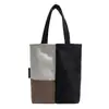 Bolsa para Garrafa de Água com Bloqueio de Cor Simples Bolsa de Mão Feminina 2026 Outono Nova Bolsa de Lona Nicho Ombro Único Bolsa Tote para o Dia a Dia