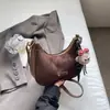 Bolsa Retrô de Nicho para Mulheres 2025 Nova Outono e Inverno Versátil Bolsa de Ombro Axila Bolsa Transversal Fashionável Bolsa Pequena Super Popular