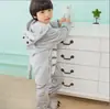 Nueva temporada popular entrenamiento de dragones niños y niñas otoño e invierno franela animal de dibujos animados mono pijama ropa de casa para padres e hijos venta al por mayor