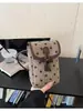 Bolso Bandolera Pequeño de Contraste Retro Otoño e Invierno para Mujer 2025 Nuevo Bolso Bandolera de Hombro Único de Moda Bolso para Teléfono Móvil de Lunares con Lazo