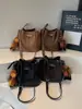 2025 Nuevo Bolso de Hombro de Otoño Bolso Retro Gran Capacidad Versátil Bolso de Hombro Cruzado Bolso Cubo Simple de Moda