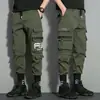 Pantalones cruzados nuevos para hombre, estilo coreano, modernos, corte holgado, estilo ins para estudiantes, pantalones cargo chic casual cortos, marca de moda, con puños en los tobillos