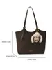 Bolsa Tote Versátil Estilo Retrô para Mulheres 2025 Inverno Novo Estilo Textura de Alto Padrão Simples Estilosa Bolsa de Ombro ou Axila
