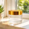 Tarro de cristal transparente de 30g con tapa dorada, disponible en stock del fabricante, botella de recarga para crema facial, botella vacía para crema de ojos cosmética