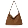 Bolso de Mujer 2026 Nuevo Vintage Nicho Gamuza Bolso Tote Simple Moderno Bolso de Hombro Cruzado Único Bolso Casual para Mujer