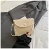 Bolsa sela estilo francês Shuai Mijia 2026 outono inicial nova padrão trançado bolsa pequena estilosa bolsa transversal retrô nicho para mulheres