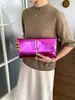 Bolsa de almacenamiento de moda transfronteriza 2026 bolsa de maquillaje portátil bolso de mano de lujo de alto valor bolsa para teléfono brillante moderna