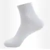 Meias masculinas de cano médio absorventes de suor desodorantes antibacterianas primavera e verão quatro estações simples cor sólida estudante versátil respirável meias esportivas