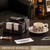Conjunto de presente de xícara e pires de café de cerâmica de alta qualidade e requintado, perfeito como uma lembrança elegante ou um pequeno presente prático para o chá da tarde.