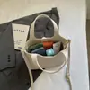 Elegante bolso de mano con patrón de lichi, bolso de hombro versátil de colores texturizados para primavera-verano, bolso cruzado de diseño para el trabajo, moderno