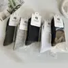 Meias Embaladas Individualmente para Homens no Outono e Inverno Cor Lisa Meias de Algodão para Homens Meias de Feira Presentes Meias Esportivas de Cano Longo para Homens