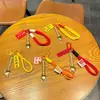 Llavero con Borla de Bolígrafo de Foil Dorado Colgante para Teléfono Regalo Inspirador de Ánimo para Graduación de Secundaria y Universidad
