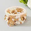 Bestseller transfronterizo Pulsera con colgante de árbol de la vida calado estilo bohemio, pulsera de cuentas con cordón elástico multicapa