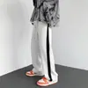 Pantalones Deportivos Casuales para Hombre Primavera y Otoño 2026, Pierna Recta, Largo Tres Cuartos, Corte Holgado, Marca de Moda, Bloque de Color, Estilo Hong Kong, Versión Coreana para Estudiantes, Pantalones de Moda