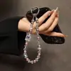 Elegante y Lujosa Botella de Perfume en Forma de Corazón Cadena para Teléfono de Cristal Perla Llavero Corto Colgante para Bolso Nuevo Modelo