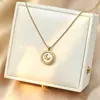 Bestseller transfronterizo: Colgante de anillo de bola de oro pequeño no descolorante de acero de titanio simple, cadena para la clavícula de lujo ligero, exquisita y versátil con eslabones grandes