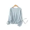 Suéter de punto de alta gama, suave y cómodo para mujer, con cuello redondo, diseño de punto calado y un corte relajado y holgado que crea un efecto adelgazante, perfecto como capa interior o top base.