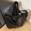Bolsa de grande capacidade para mulheres Outono e Inverno All-matching 2023 novo nicho de moda design banda larga ombro mensageiro saco bolinho saco