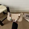 2026 Verano Nuevo Bolso de Mano de Moda para Mujer Bolso Tejido de Paja a la Moda para el Hombro Ligero Bolso Tejido de un Solo Hombro Bolso de Mujer con Perlas