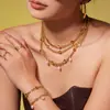 Set de Joyería de Acero Inoxidable Chapado en Oro de 18K con Diseño de Nicho Ins Collar con Borlas de Perlas de Imitación Pulsera