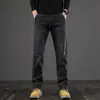 Jeans masculinos de alta qualidade de Hong Kong, novo estilo outono e inverno 2026, perna reta solta, forrado com fleece, espessado, calça de negócios leve